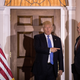 Donald Trump points at U.S. Marine Corps General John Kelly before their meeting at Trump International Golf Club, November 20, 2016 in Bedminster Township, New Jersey.